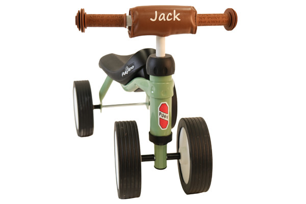 Optional: brauner Lenkerpolster mit Wunschname